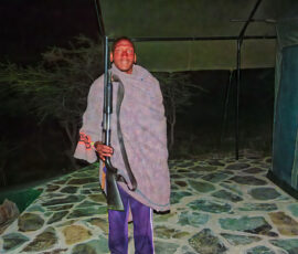 Maasai Guard at Buffalo Camp (Photo by Jeff Drake)